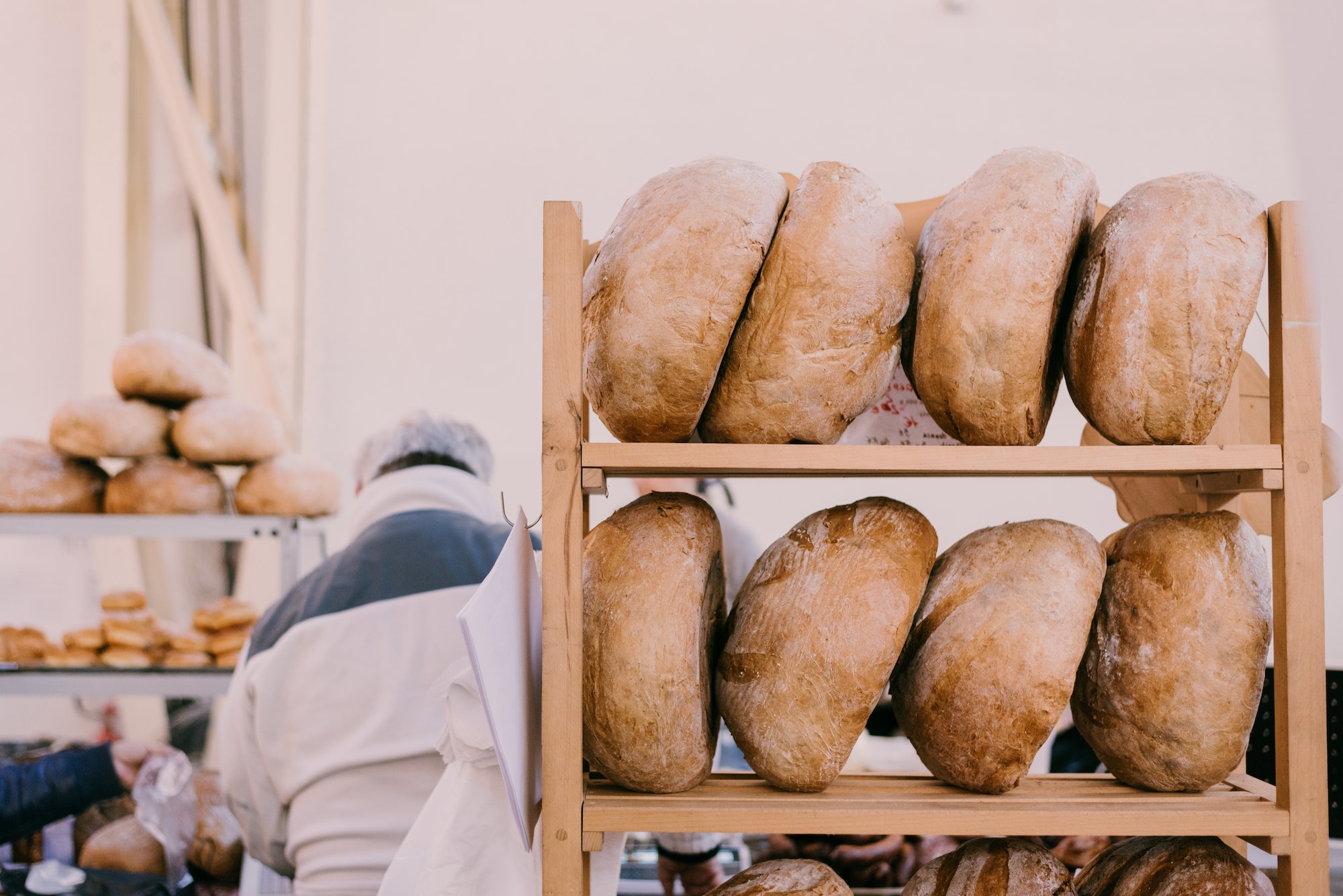 Loafs of fresh bread at a local market. Buy local, support small bussiness. Small bakery.