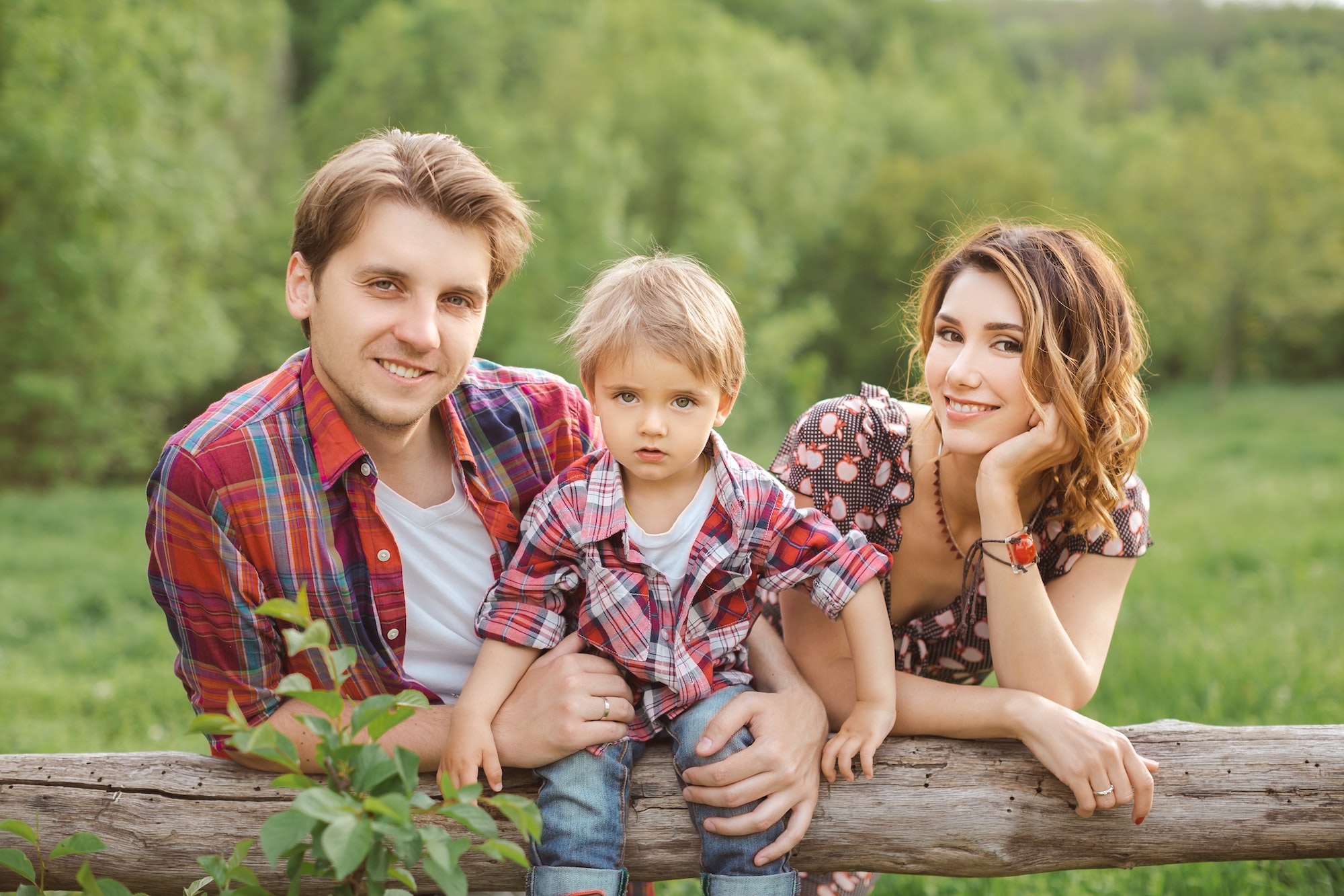 Portrait of Happy Family in a Park